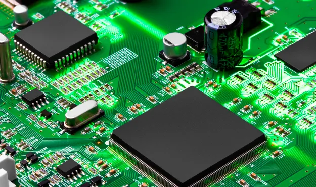 A close-up of a printed circuit board with various components.