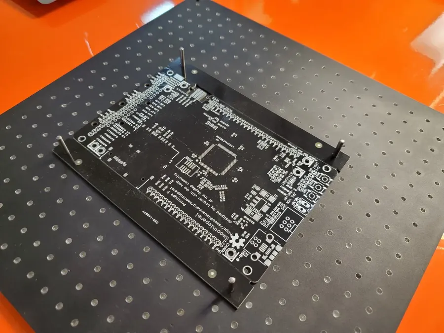 A large quantity of PCB stencils ready for use.