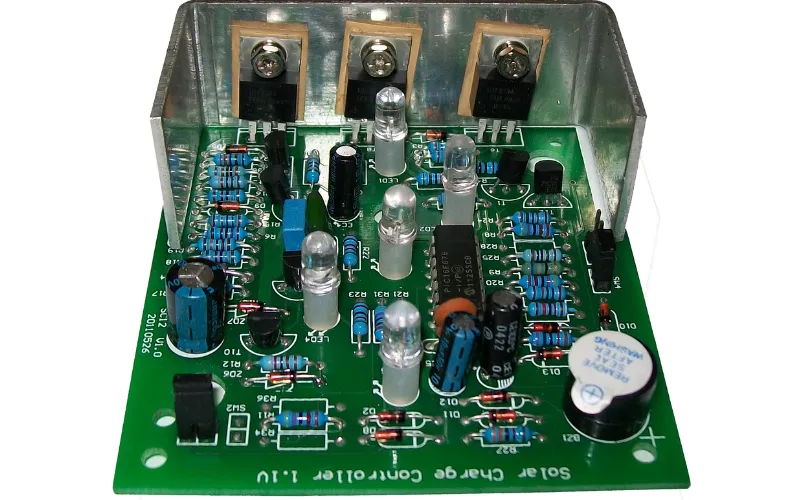 A close-up of a UPS PCB board with various components.