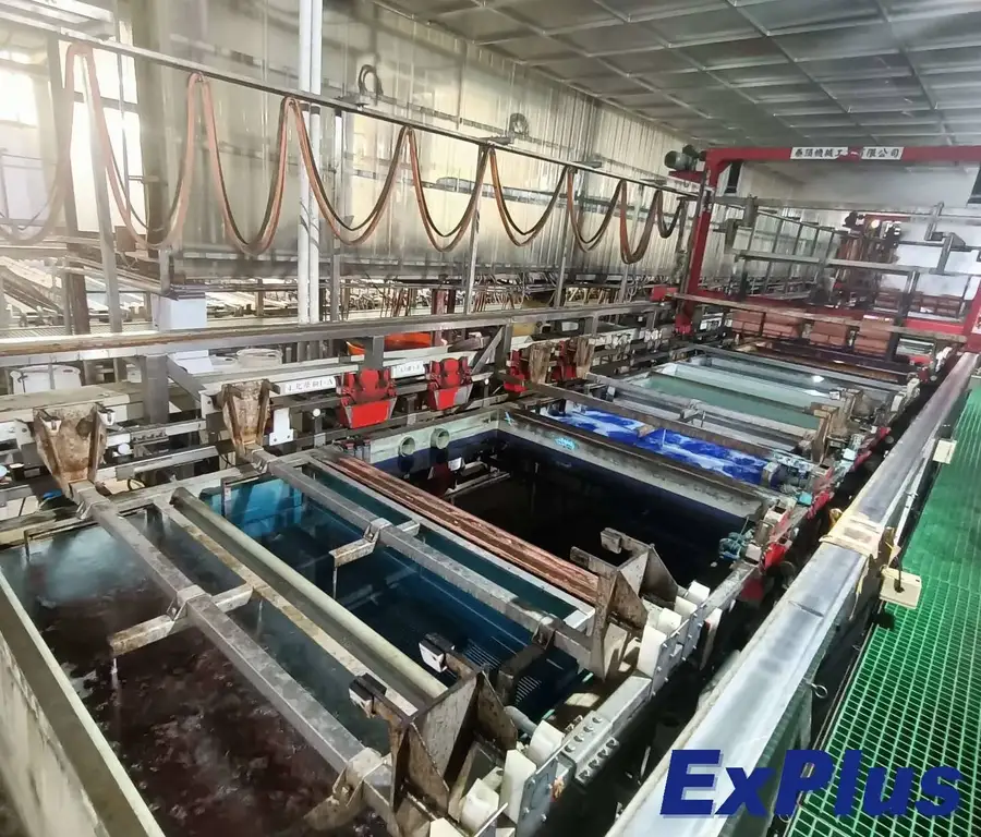 A view of a factory floor with machinery used in FPC manufacturing.