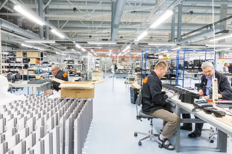 A view of a PCB manufacturing facility with various production equipment.