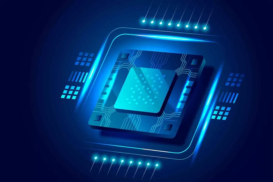 A close-up of various electronic components, including integrated circuits, on a table.