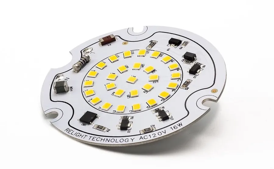 A LED light fixture utilizing an aluminum PCB.