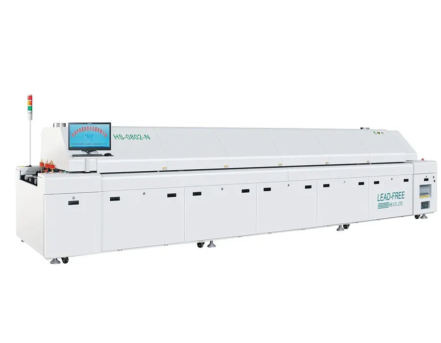 A PCB going through the reflow soldering process in an SMT oven.