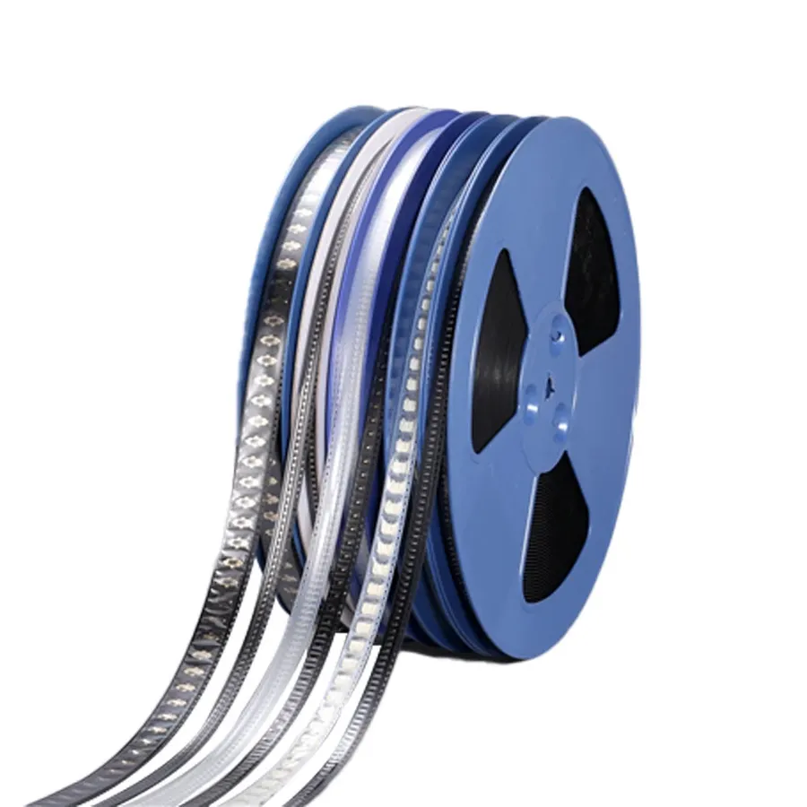 Reels of SMD components used in PCB assembly.