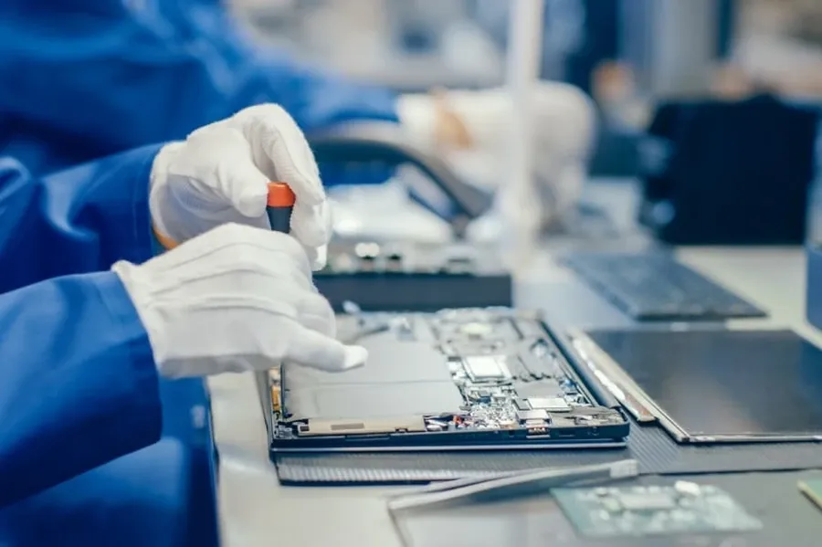 Interior view of a TTM PCB manufacturing plant with automated equipment.