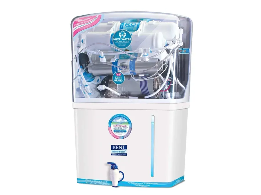A technician repairing a Kent RO water purifier with tools and a replacement PCB.