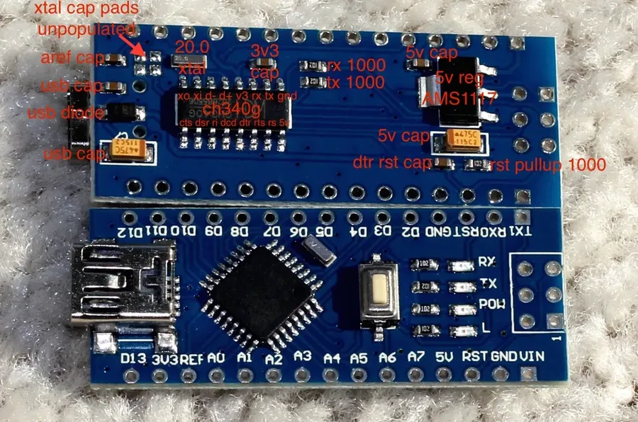 An Arduino board with clearly labeled components and connections.