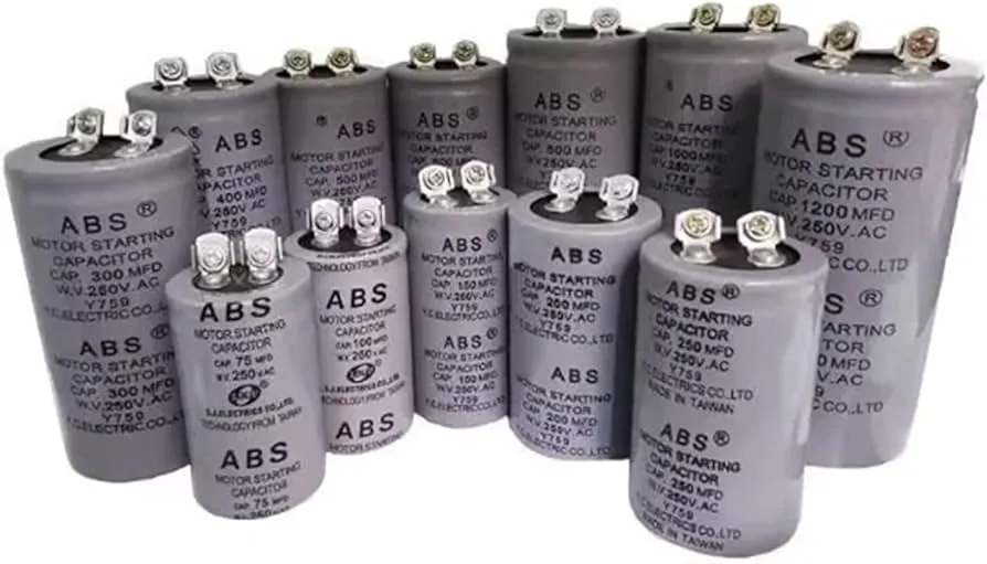 A collection of motor capacitors of various sizes and shapes.