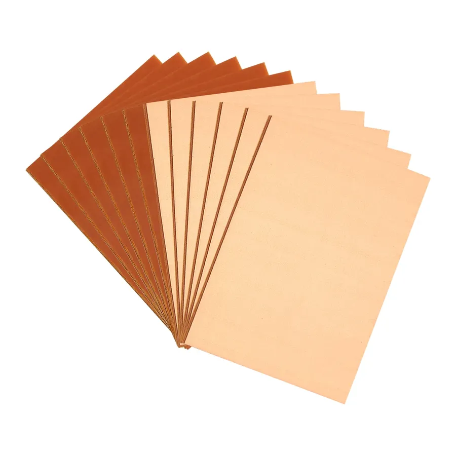 A close-up of a stack of blank PCB boards.