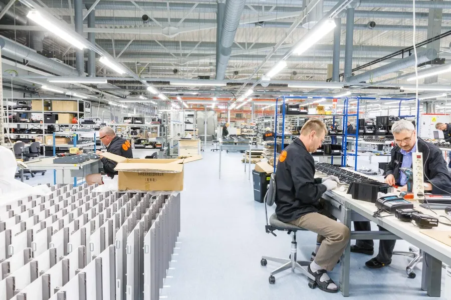 A view of a PCB manufacturing factory floor with equipment.
