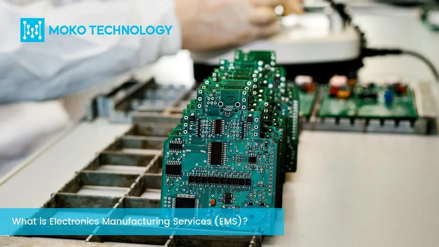 A PCB being assembled by a worker at an EMS facility.