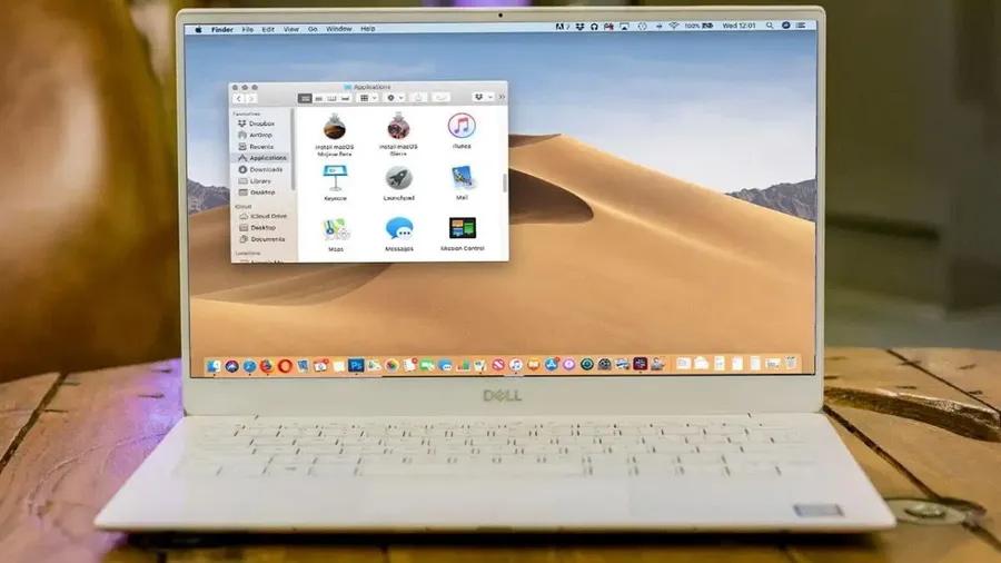 A screenshot of a macOS desktop showing a Windows virtual machine running.