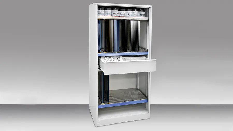 PCB stencils being stored in a storage rack.