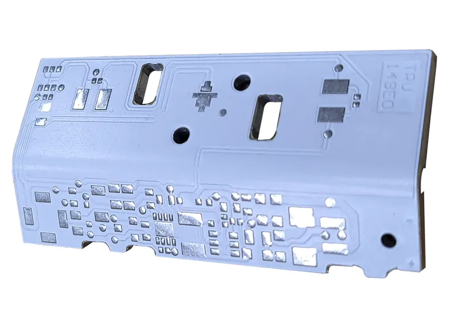 A close-up view of an IMS PCB showing its metal base and circuitry.