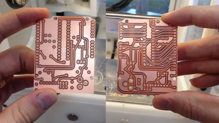 A double sided printed circuit board with components.