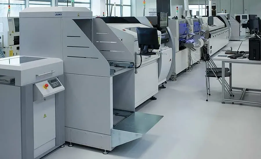 A view of a PCBA assembly line with different machines.