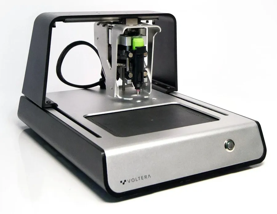 A Voltera V-One printer on a desk.