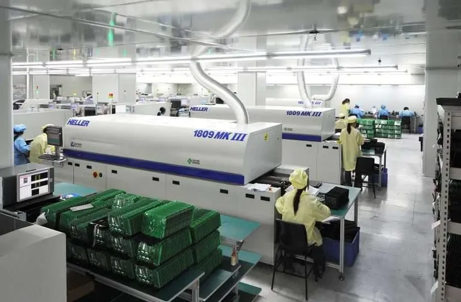 A PCB manufacturing facility with various machines and equipment.