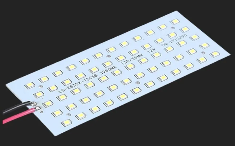 An aluminum LED PCB with visible circuit traces.