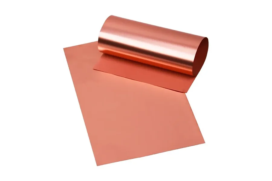 Close-up of a PCB with copper traces and different materials