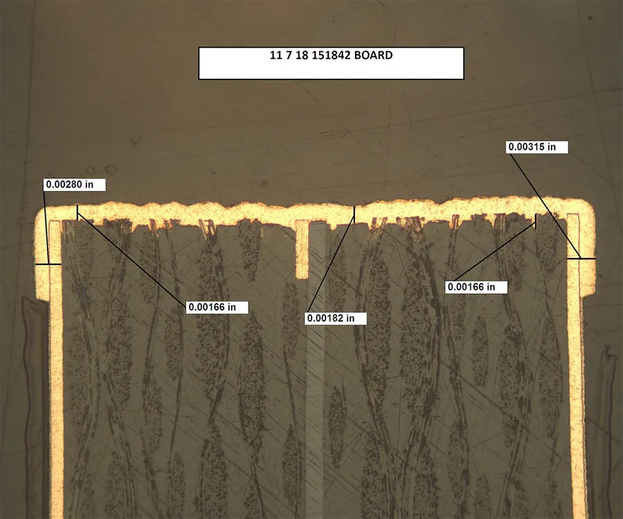 A close-up cross-sectional view of a 10-layer PCB, showing the different layers.