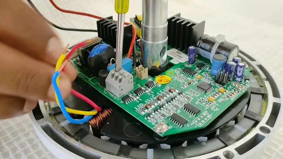 A variety of BLDC fan PCBs on a table.
