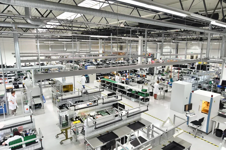 A view of a cleanroom environment in an integrated circuit fabrication facility.