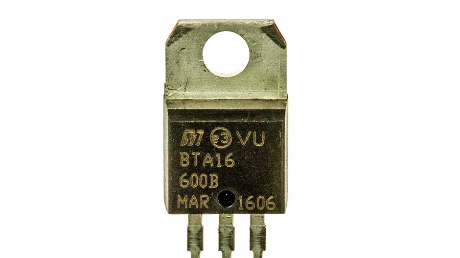 A close-up of a TRIAC electronic component.