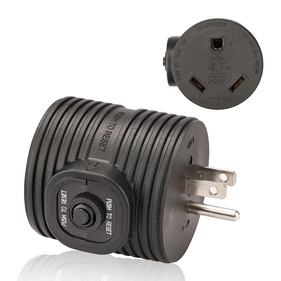 A close up of a electrical circuit and a power plug.