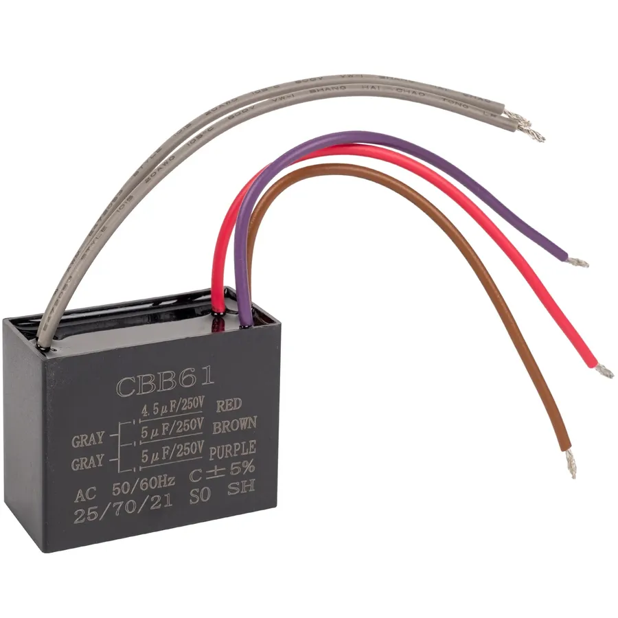 A new fan capacitor ready for installation.