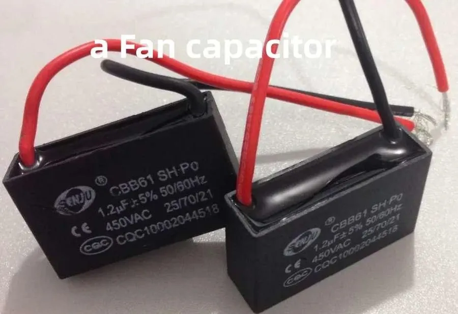 A collection of various fan capacitors with different shapes and sizes.