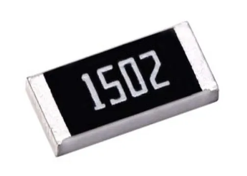 A close up of surface mount resistors with markings visible.