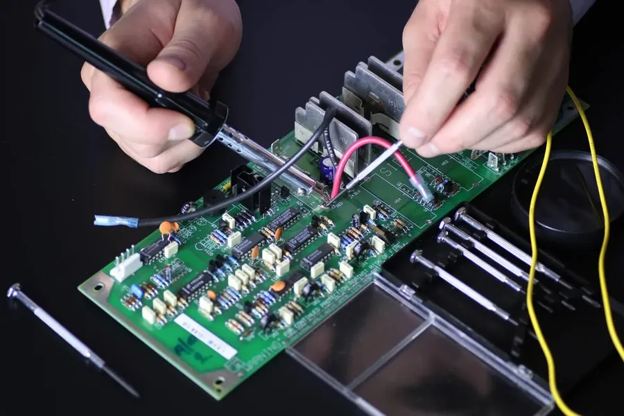 An internal view of electronic devices, showing PCBs.