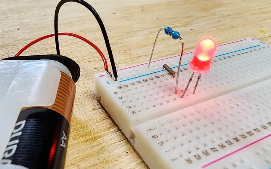 A circuit diagram showing an LED powered with a 220 ohm resistor.