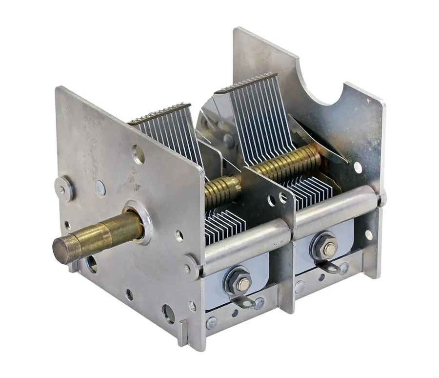 Disassembled view of an air variable capacitor showing its internal components.