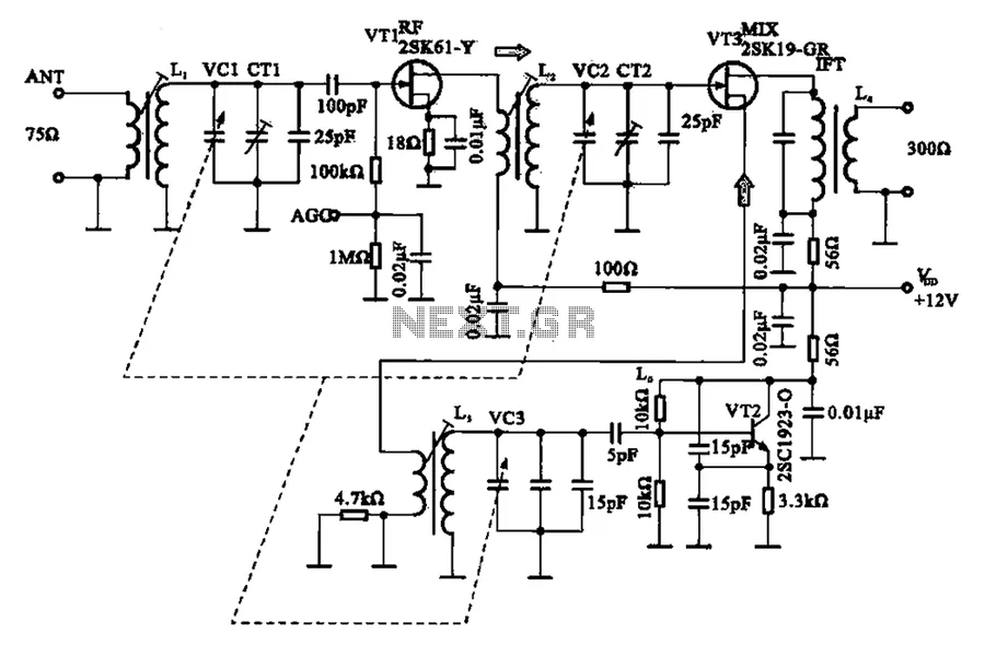 A radio circuit board with a variable capacitor for tuning.