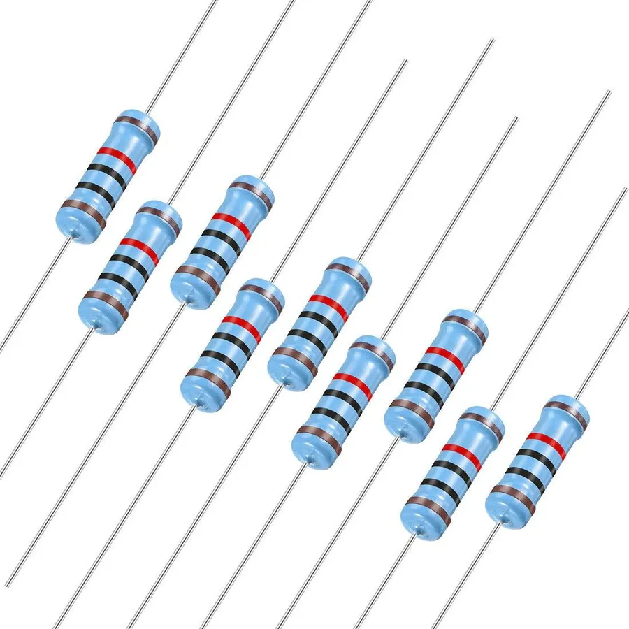 A 10k resistor with its color bands visible.