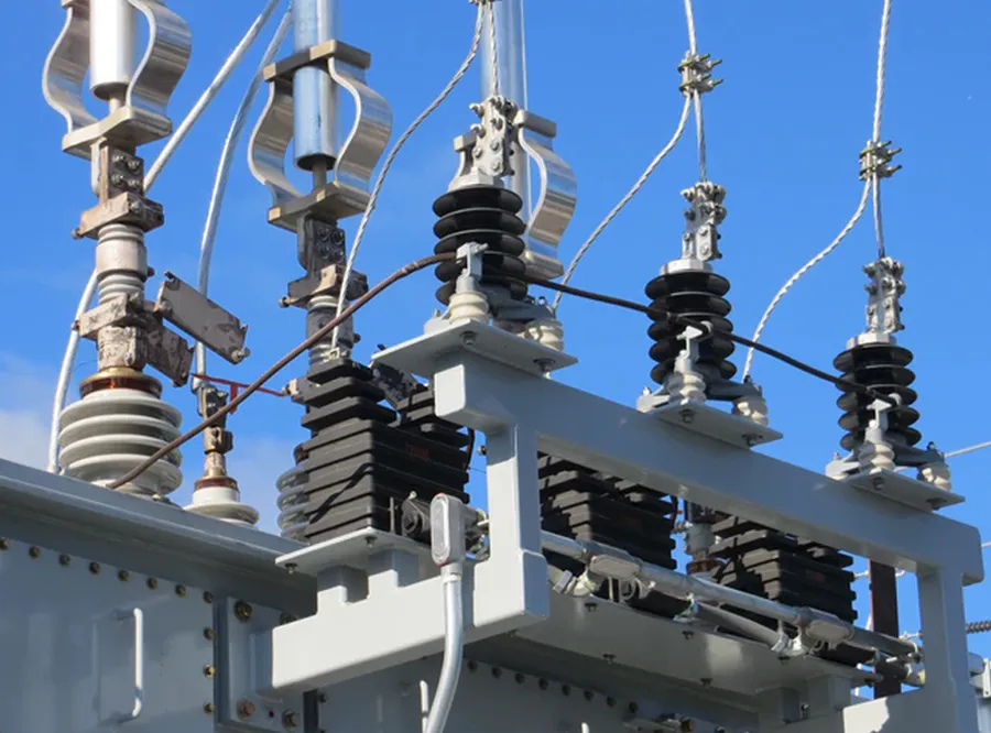 Transformer bushings connected to the transformer.
