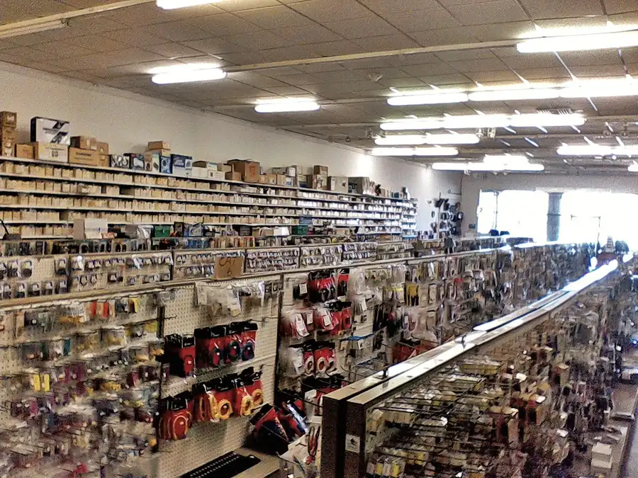 A view of a retail store with various electronic components on display.