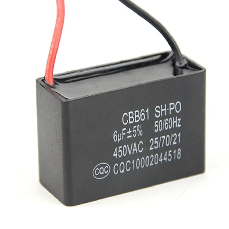 A person replacing a CBB61 capacitor in a device.