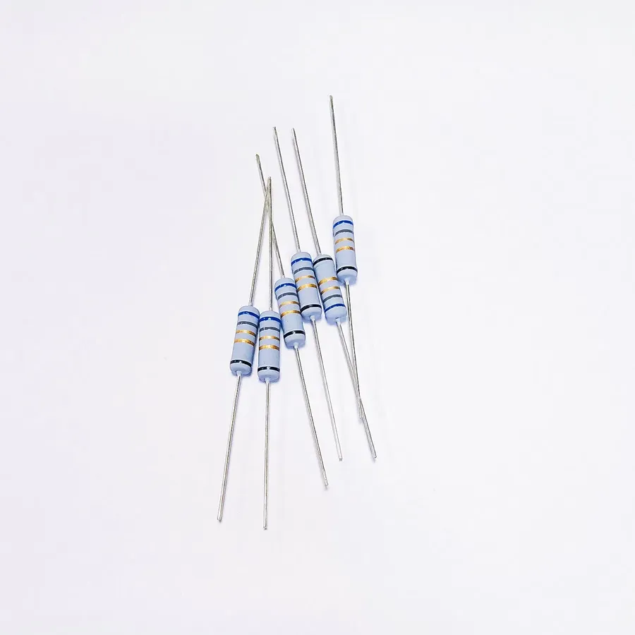 A wire wound resistor soldered on a printed circuit board.