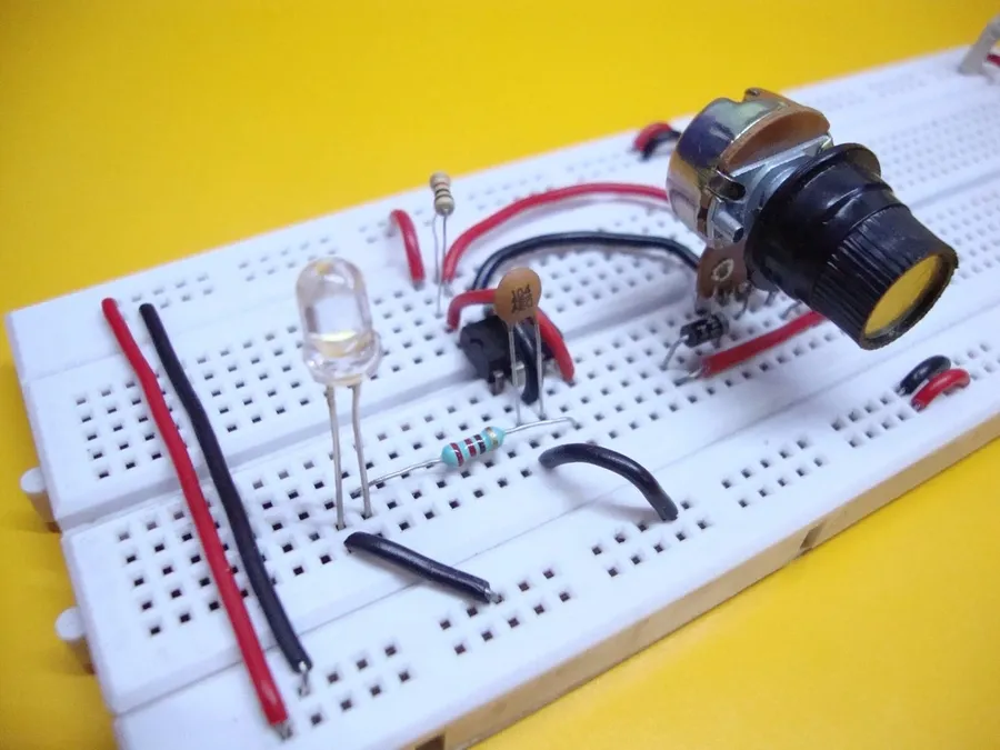 A complex breadboard circuit project with various components and wires.