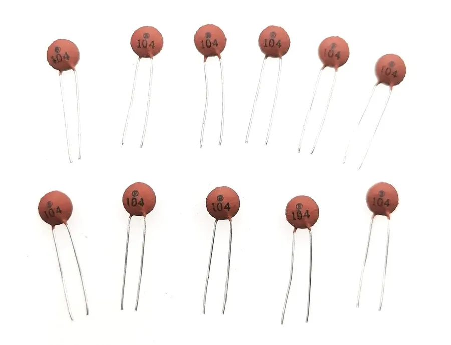 A close-up showing the '104' marking on a capacitor.