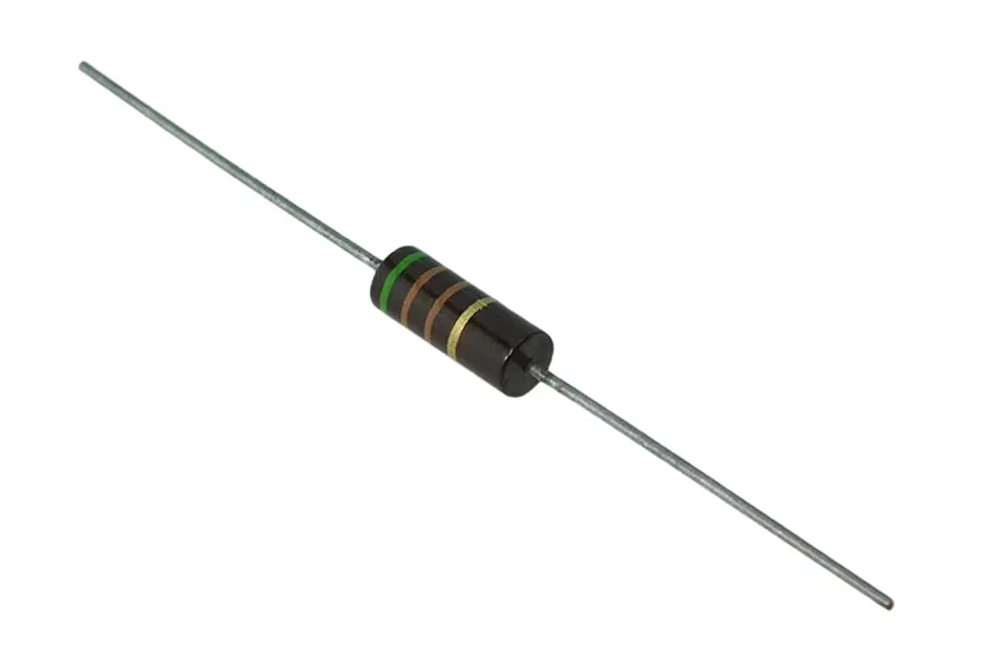 A close-up of a carbon composition resistor with its color bands visible.