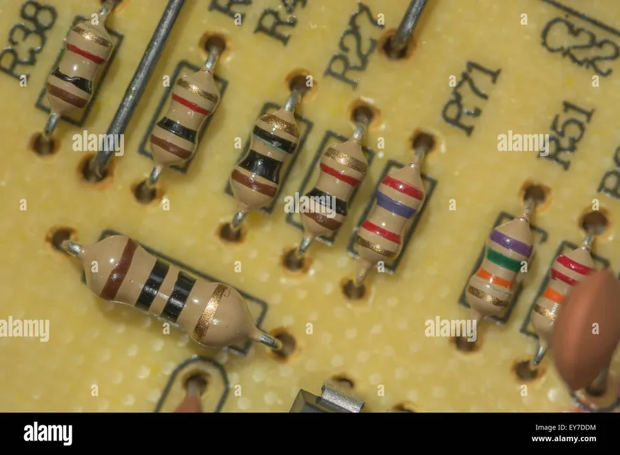 Several carbon resistors soldered on a printed circuit board.