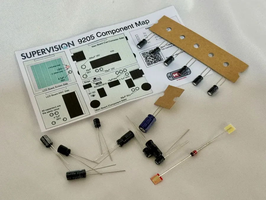 A person using tools to replace a capacitor on an electronic device.