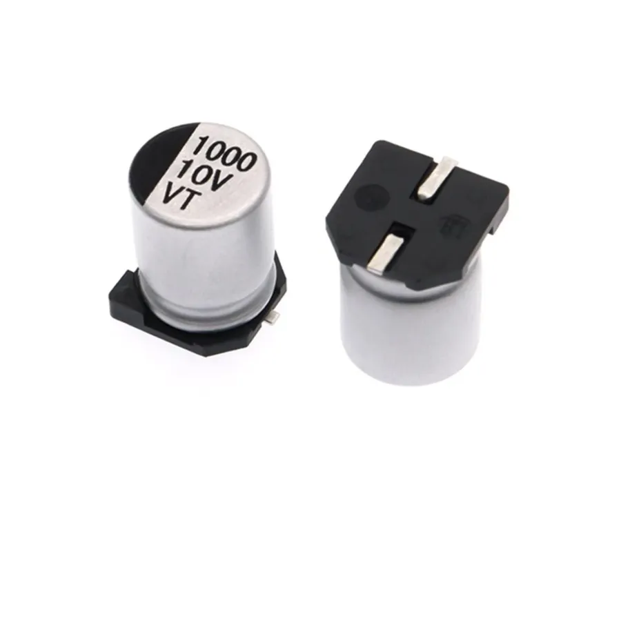 Surface mount aluminum electrolytic capacitors on a PCB.