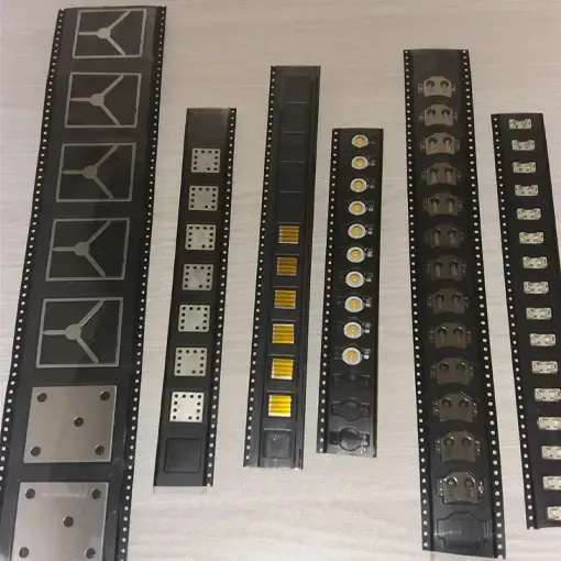 Various packaged electronic components on a table.
