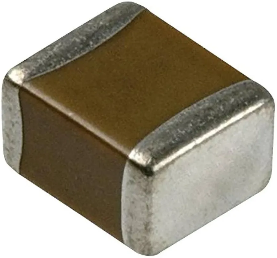 A surface mount ceramic 1uF capacitor on a circuit board.
